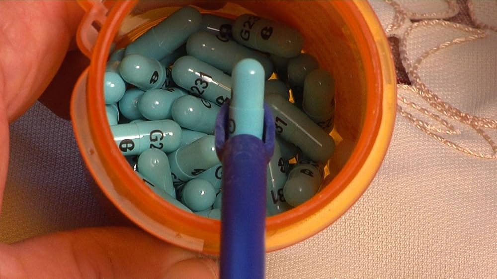 Dietary supplements pills on wooden spoon